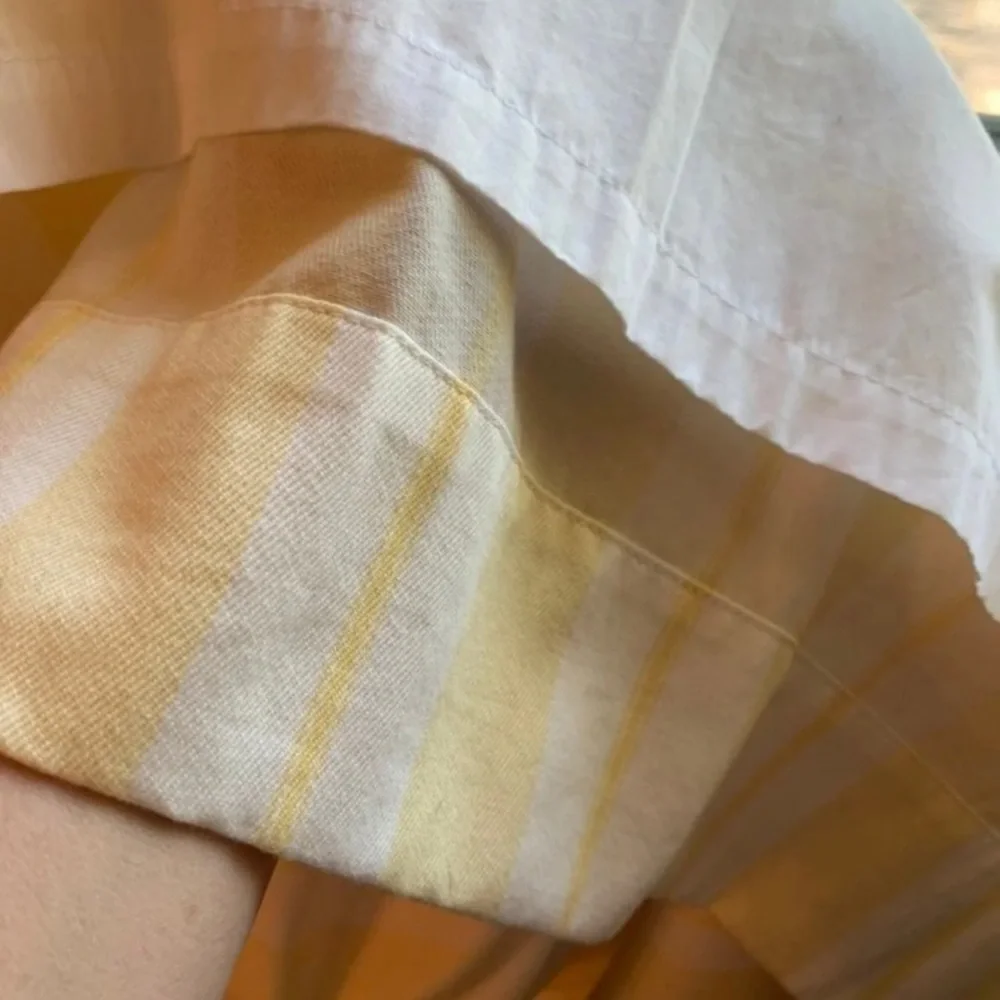 Pottery Barn Light yellow and white striped drapes